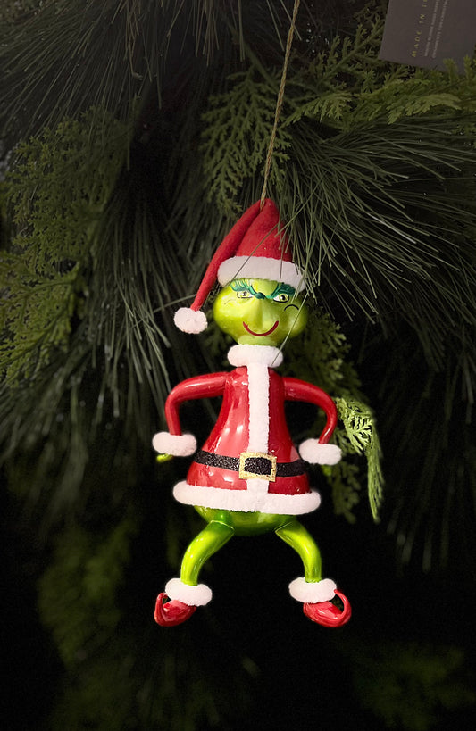 deCarlini Grinch Dressed As Santa